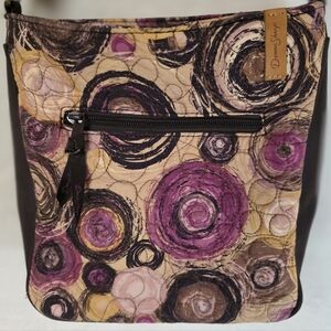 Donna Sharp "Expression" Becki crossbody featuring a quilted circular batik Patt
